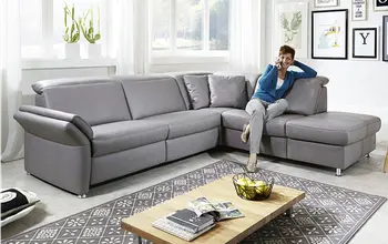 Europamöbel Bild mit Frau auf Sofa